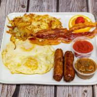Combo Breakfast Plate · Choice of 2 pancakes or french toast, 2 eggs, 2 sausages, 2 bacons. Served with hash browns.