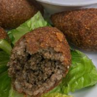 Kibbie · 3 lean beef shells mixed with crushed burgul wheat and stuffed with spiced ground beef and r...