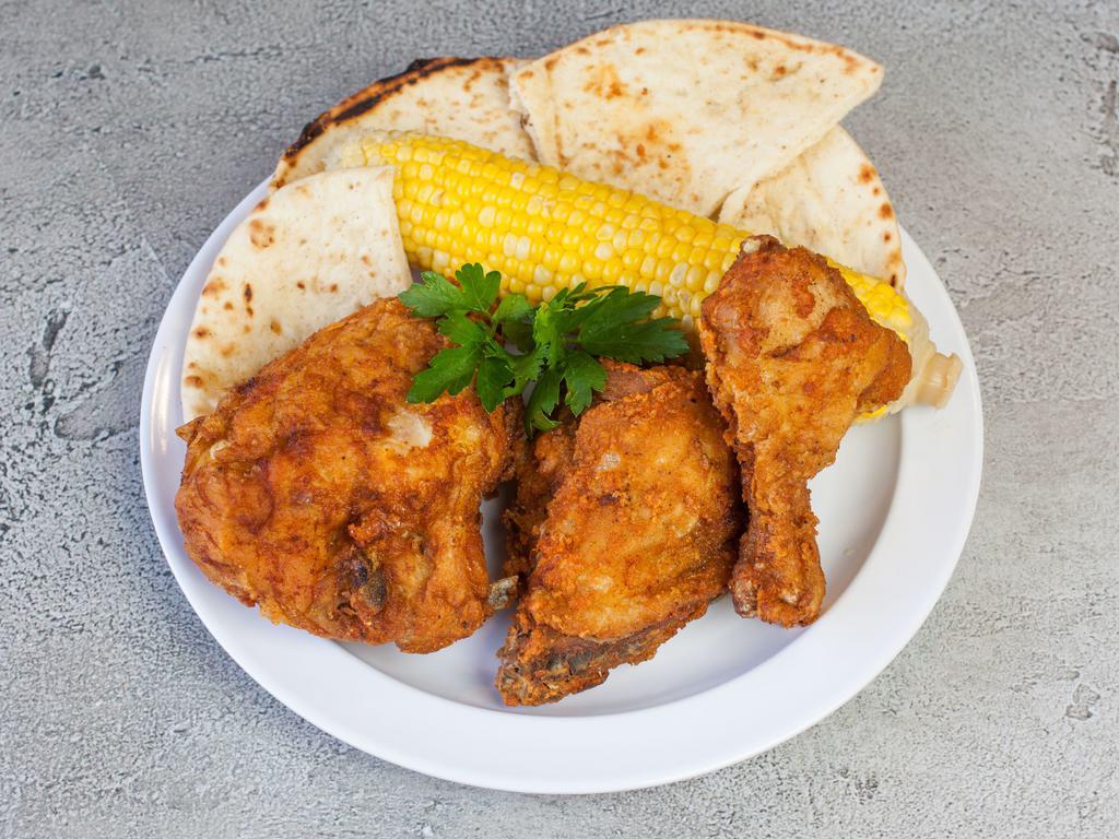 3 Piece Fried Chicken Meal · Served with pita bread, choice of sauce and side.