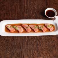 Amazing Salmon · Seared Salmon Served with Scallion & Yuzu Sauce.