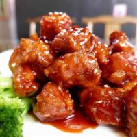 A6. Spareribs with house tangy (sweet + sour) sauce 京都肉排 · A cut of meat from the bottom section of the ribs. 