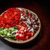 Chicken and Gyro Over Rice bowl · Take your taste buds to a journey of ancient Greece with juicy beef gyro and grilled chicken...
