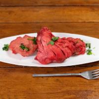 Tandoori Chicken · Spring chicken marinated in yogurt and mild spices roasted in the clay oven.