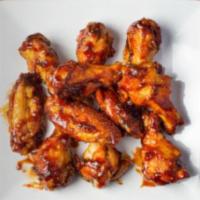 Traditional Wings - 200 wings  · Select your choice of sauce -- Buffalo , Honey Garlic, House Afghani sauce , Boom Boom Sauce...