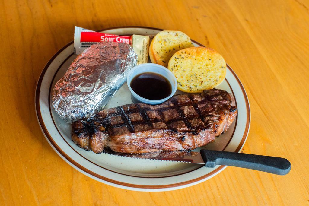 14 oz. New York Strip Steak · Include with one side.