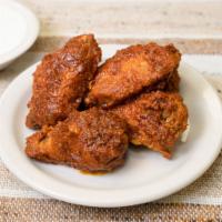Habanero Wings (6) · Crispy deep fried chicken wings drizled in our homemade red habanero sauce