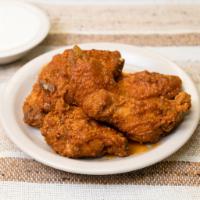 Buffalo Wings (6) · Crispy deep fried chicken wings covered with our homemade buffalo sauce