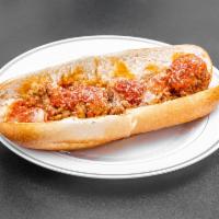 Mrs. D's Meatball Parm Sandwich · Sandwich with seasoned meat that has been rolled into a ball topped with tomato sauce and ch...