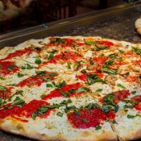 Margarita Pizza Slice · Fresh mozzarella, plum tomato sauce, basil and olive oil.