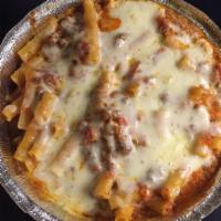 Baked Ziti · Smooth tube shaped pasta cooked in an oven.