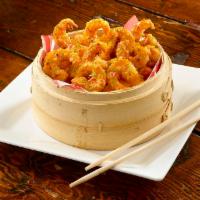 Firecracker Shrimp · Crisp popcorn shrimp tossed in our creamy chipotle garlic sauce.