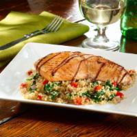 Balsamic Salmon · Grilled salmon drizzled with balsamic glaze and served on a bed of quinoa with spinach, pepp...
