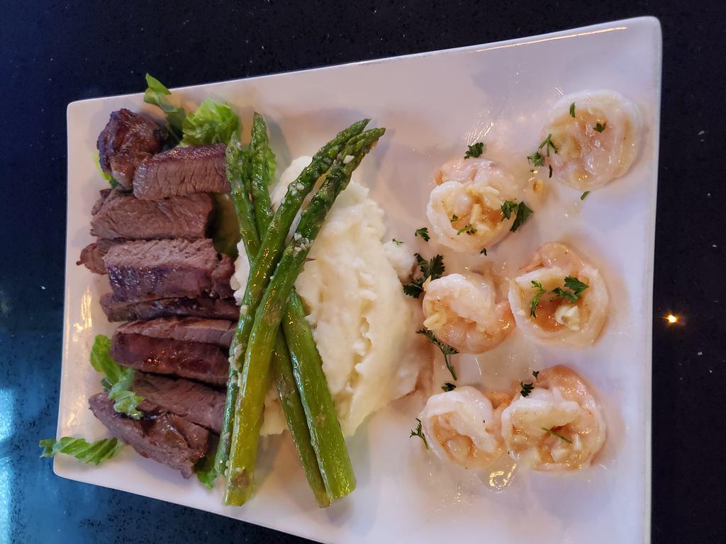 Steak & Shrimp · Grilled Sirloin & Shrimp with butter and garlic. Served, mashed potatoes and asparagus 