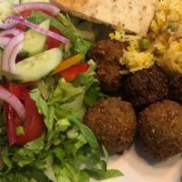 FALAFEL PLATTER · Served w/ Greek Salad, Home-Made Tzatziki or Hummus Spread & Pita Bread - Choice of Mediterr...
