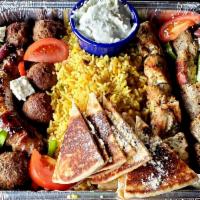 MEZZE PLATTER · Loukanico (Greek Sausage), Greek Meatballs, Chicken & Pork Souvlaki, Mediterranean Rice, Sal...