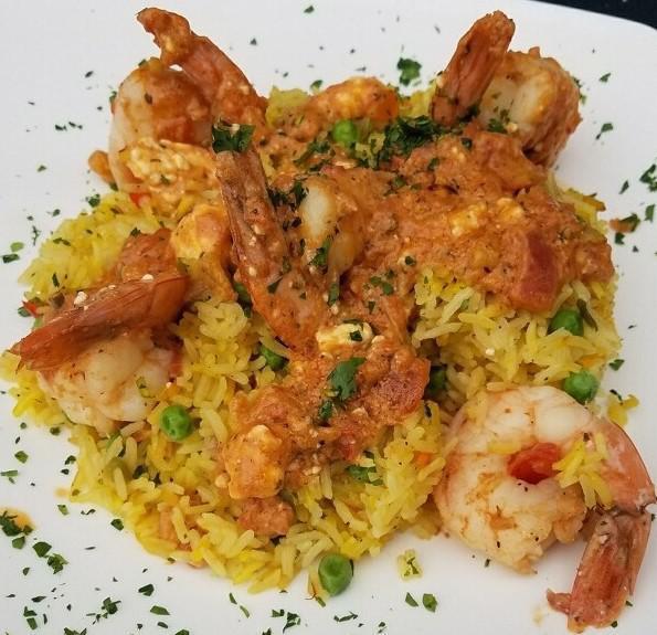 Chef Niko's Shrimp Santorini · Grilled Shrimp in a Delicious Tomato & White Wine Sauce & Melted Feta Cheese - Choice of Linguine, Ziti or Mediterranean Rice - Served w/ a House Salad & Our Homemade Greek Dressing on the Side