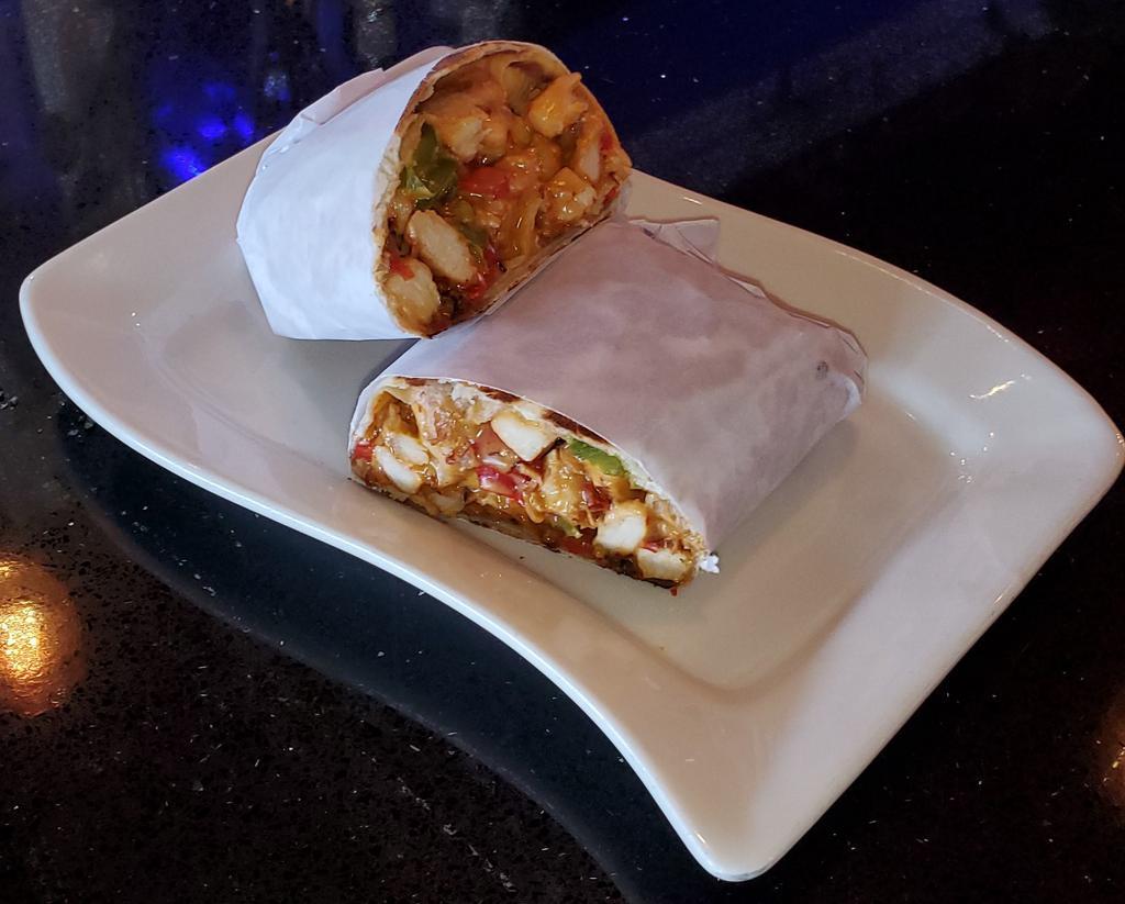 CHICKEN PHILLY WRAP · Grilled & Smothered w/ Sauteed Red Onions, Red & Green Peppers & Topped w/ American Cheese - Choice of Wrap or Pita Bread