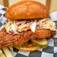 Vegas Hot Chicken Sandwich · Buttermilk fried chicken, dipped in hot pepper oil with pickles and slaw on a brioche bun. S...