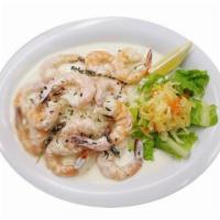Shrimp Scampi · Sauteed in a delicious garlic butter served over rice. Served with cabbage salad and choice ...