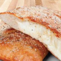 Lotza Mozza Calzone · A soft and chewy oven-baked pocket generously stuffed with lots of mozzarella cheese. Served...