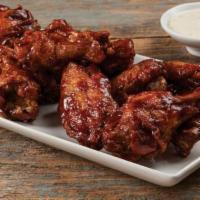 Bone in Wings · One pound of Bone-In Chicken Wings.  Crispy on the outside, plump and juicy on the inside. O...