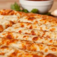 Cheesesticks (16 Pc) · A special blend of garlic, Italian seasoning and lots of mozzarella cheese make our cheesest...