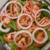 Tossed Salad · Lettuce, tomatoes, onion (comes with Italian dressing on the side) 