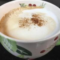 Cappuccino · Nespresso espresso coffee with milk froth, cinnamon and sugar on the side