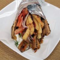 Chicken Gyro Sandwich (shawarma) · Tender marinated chicken wrapped in pita bread with tzatziki or mustard sauce,thinly sliced ...