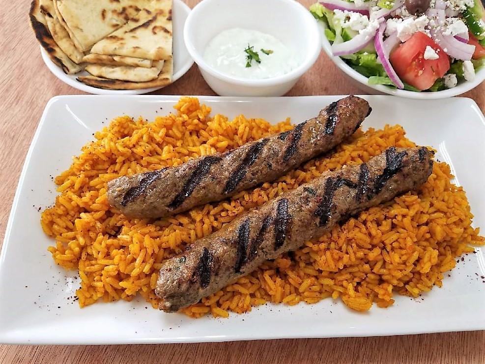Lamb Kebab Platter · 2 juicy perfectly seasoned lamb patties. Comes with Greek yogurt and esme tomato sauce or tzatziki. Includes Greek salad, pita bread and your choice of rice, fries or lemon roasted potatoes. (recommended with tom.sauce & yogurt)