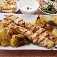 Souvlaki Chicken Skewer Platter · 2 perfectly cooked juicy skewers. Comes with tzatziki. Includes Greek salad, pita bread and ...