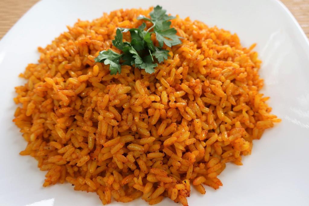Yellow Rice · Aromatic rice pilaf infused with spices.