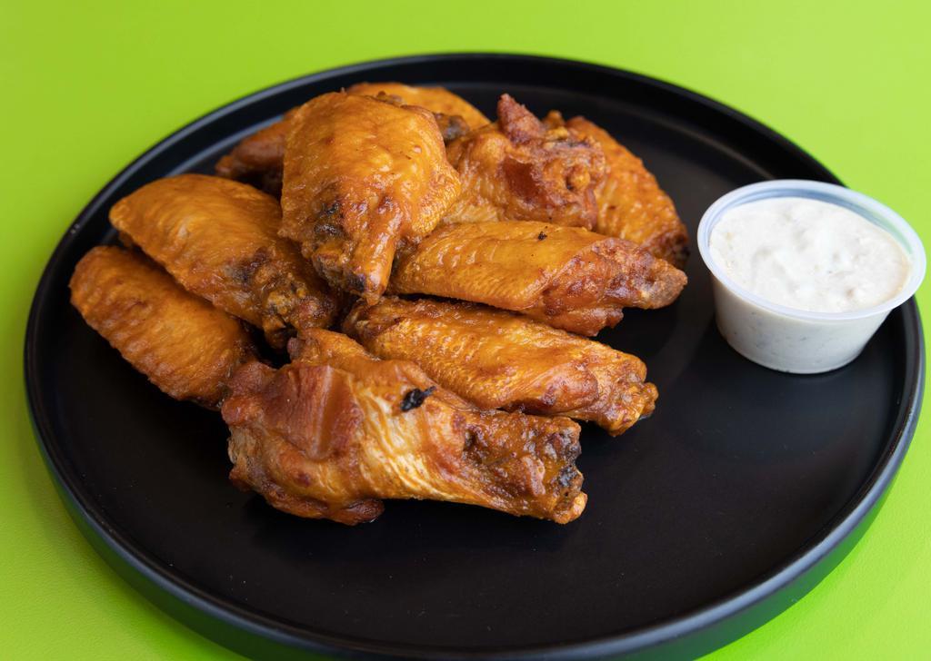 12 Piece Wings · 1 dozen. Bone-in wings deep-fried. Boneless wings double dredged between a buttermilk brine and seasoned flour, then deep-fried. Add a sauce for an additional charge. Add extras for an additional charge. 