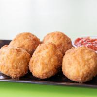 Arancini · Chicken broth cooked albino rice balls, stuffed with mozzarella cheese and parsley blend, dr...