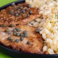 Chicken Picatta · Marinated chicken breast, dredged in seasoned flour, fried in LF butter, then cooked in a sh...