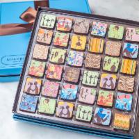 36pcs Tier Box Ganache · These fanciful cubic treasure chests fan open to display 36 chocolate ganache jewels, artful...