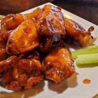 Buffalo Wings · Cooked wing of a chicken coated in sauce or seasoning.