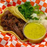 Barbacoa Taco · Served with cilantro, onions and salsa.