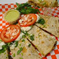 Quesadilla · Served with your chooice of meat, mozzarella cheese, tomato, onion, lettuce and salsa.
