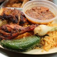 Half grilled chicken · 1/2 chicken grilled on mesquite charquel. Served with 12 oz of rice, 
12 oz of beans, grille...