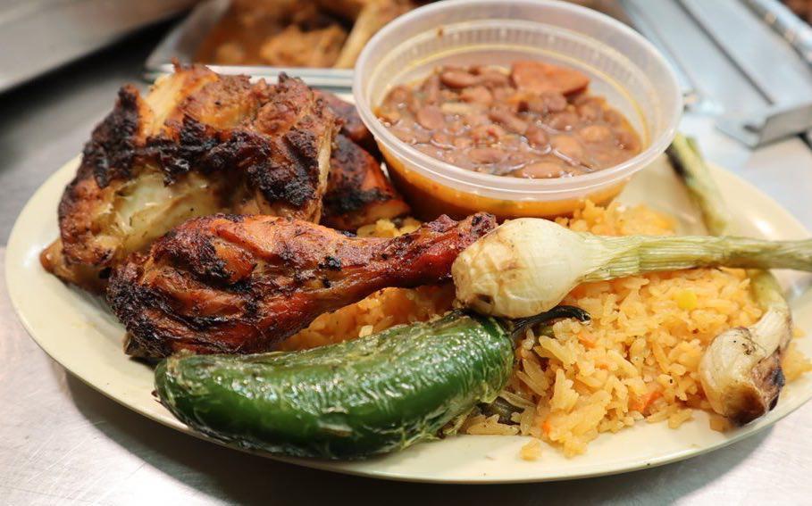 Half grilled chicken · 1/2 chicken grilled on mesquite charquel. Served with 12 oz of rice, 
12 oz of beans, grilled onion, grilled peppers, chili pepper, tortillas and salsa