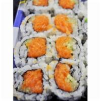 Spicy Salmon Roll · Spicy salmon and cucumber. Sushi roll is 8 pieces. Hand roll is a cone shape.(raw)