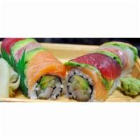 Rainbow Roll · Crab stick and avocado with cucumber roll and topped with assorted fish.(raw)