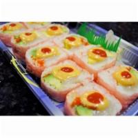 Holiday Roll · Scallop, mango, avocado, cucumber, masago, and wrapped in soy paper with spicy mayonnaise on...