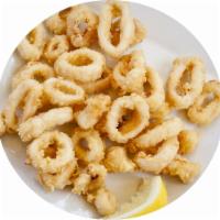 Fried Calamari Napoletan style · Tender calamari, coated with seasoned flour and deep fried to perfection. served with Marina...