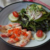 Snow Crab Salad · Spring mix salad with snow crab, cucumber, tobiko and crunch with spicy mayo.