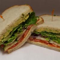 Veggie Sandwich · Whole wheat bread with lettuce, tomato, red onion, cucumber, avocado, and creamy house made ...