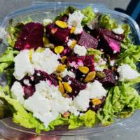 Roasted Beet & Pistachio Green Salad · Mixed greens with house roasted beets, goat cheese, and Wonderful