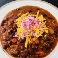 Texas Beer Chili · Hefty chunks of chili grind plus hearty seasoned homestyle ground beef slow simmered in a lo...