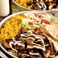 Chicken Over Rice Platter · Chicken,rice,lettuce,tomatoes white sauce or hot sauce